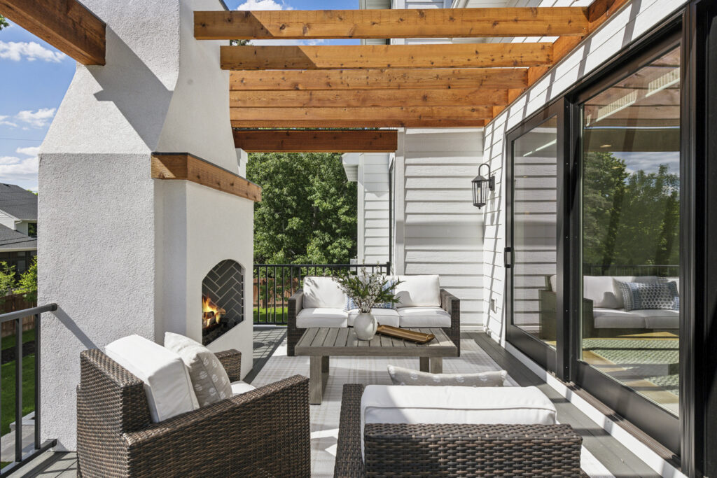 Deck fireplace and pergola. Hearth Hideaway - Mom's Design Build